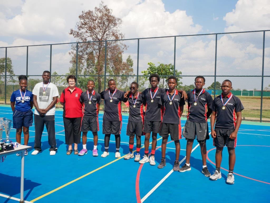 ANSA Basketball Academy team celebrating together – Nairobi, Kenya